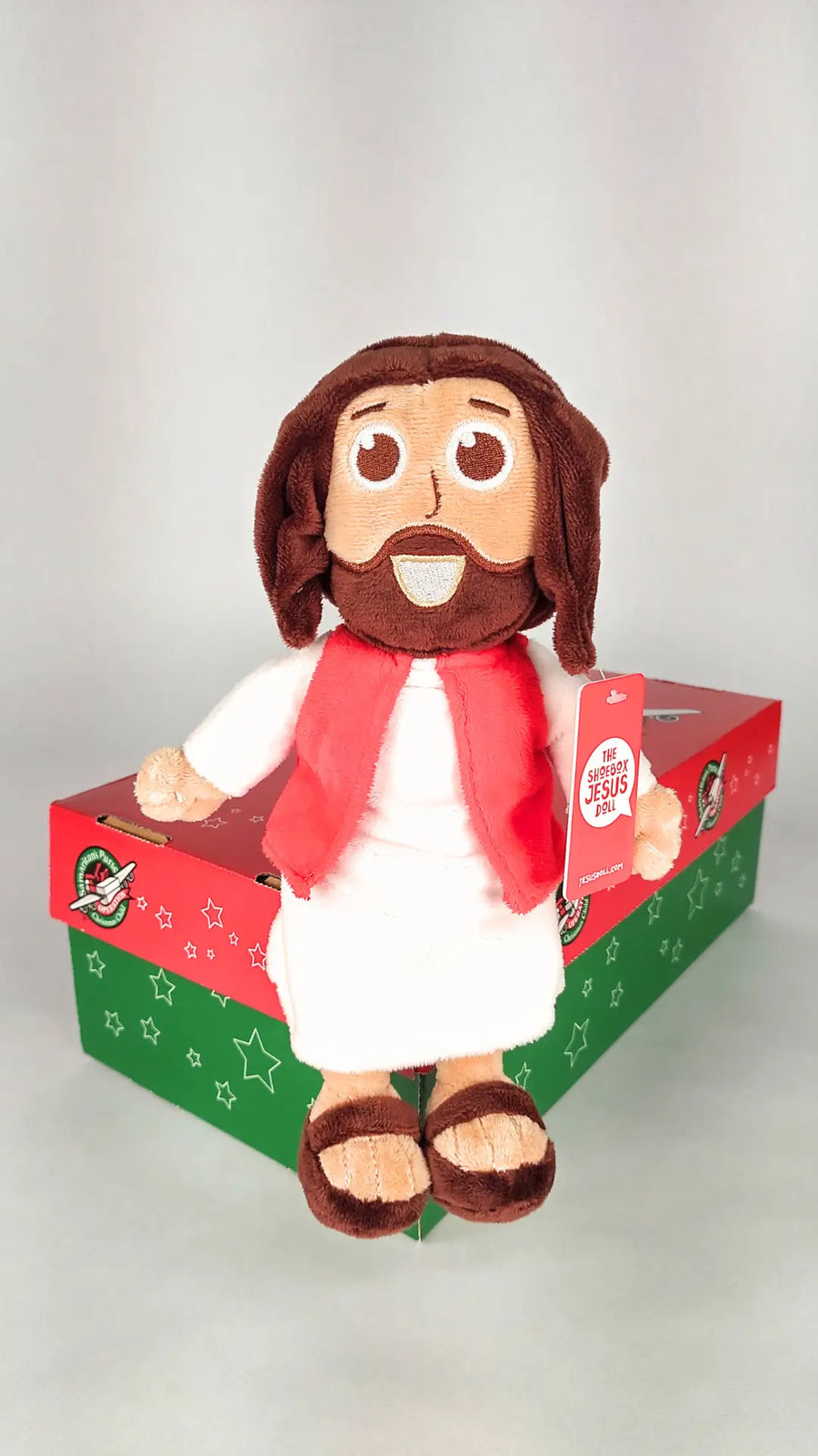 Jesus outstretched arms welcome any child for Samaritans Purse Operation Christmas Child shoebos program.